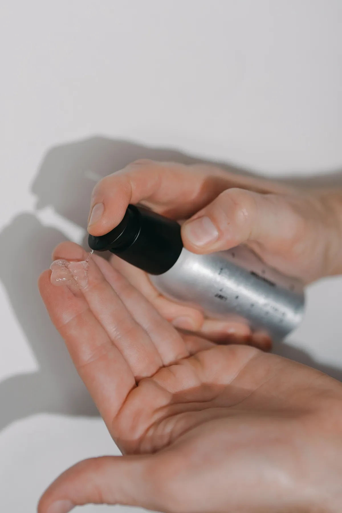 Hydration Gel dispensed from the bottle into an open palm