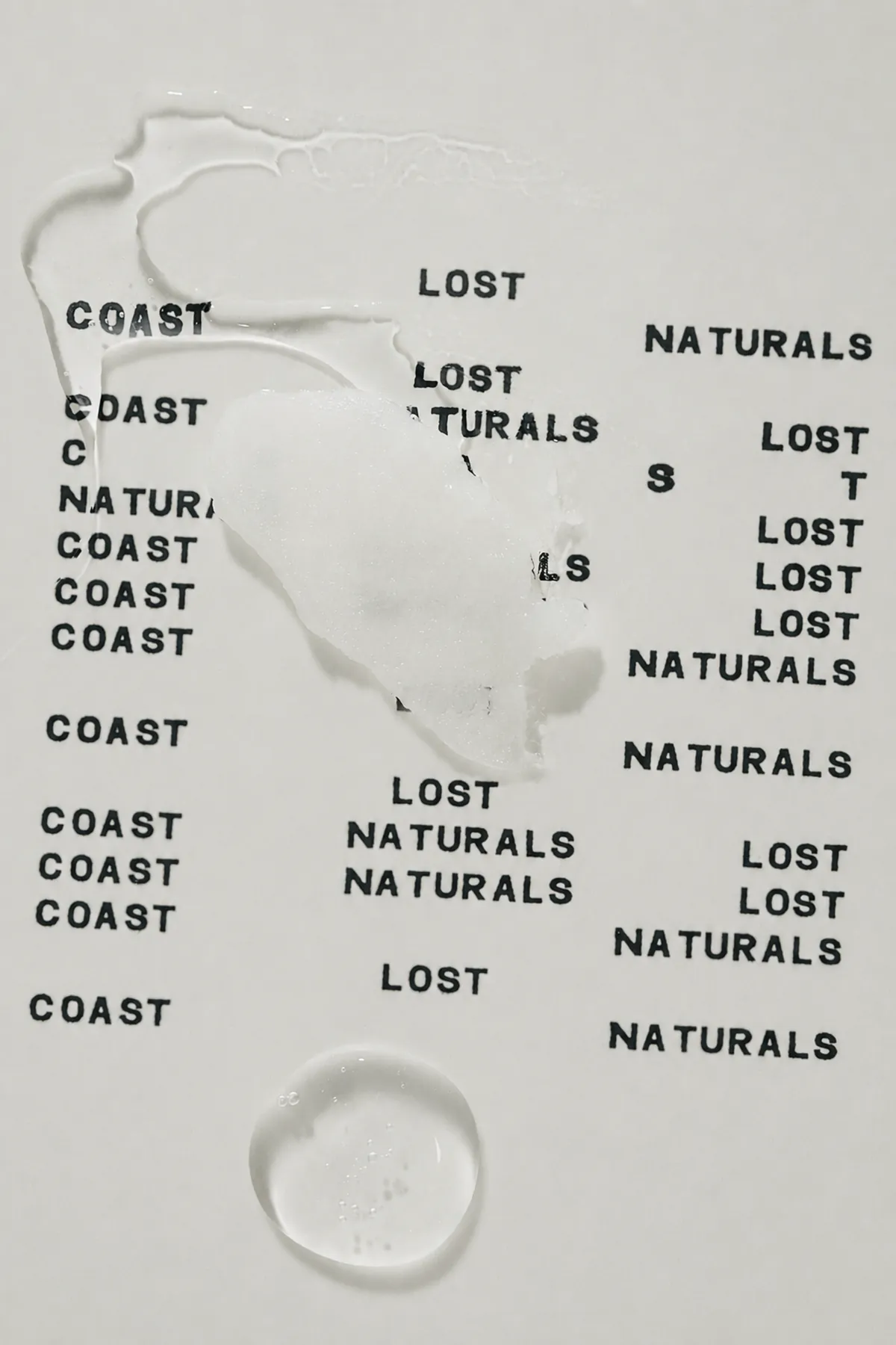 Barrier Balm drawn across a printed Lost Coast Naturals sheet